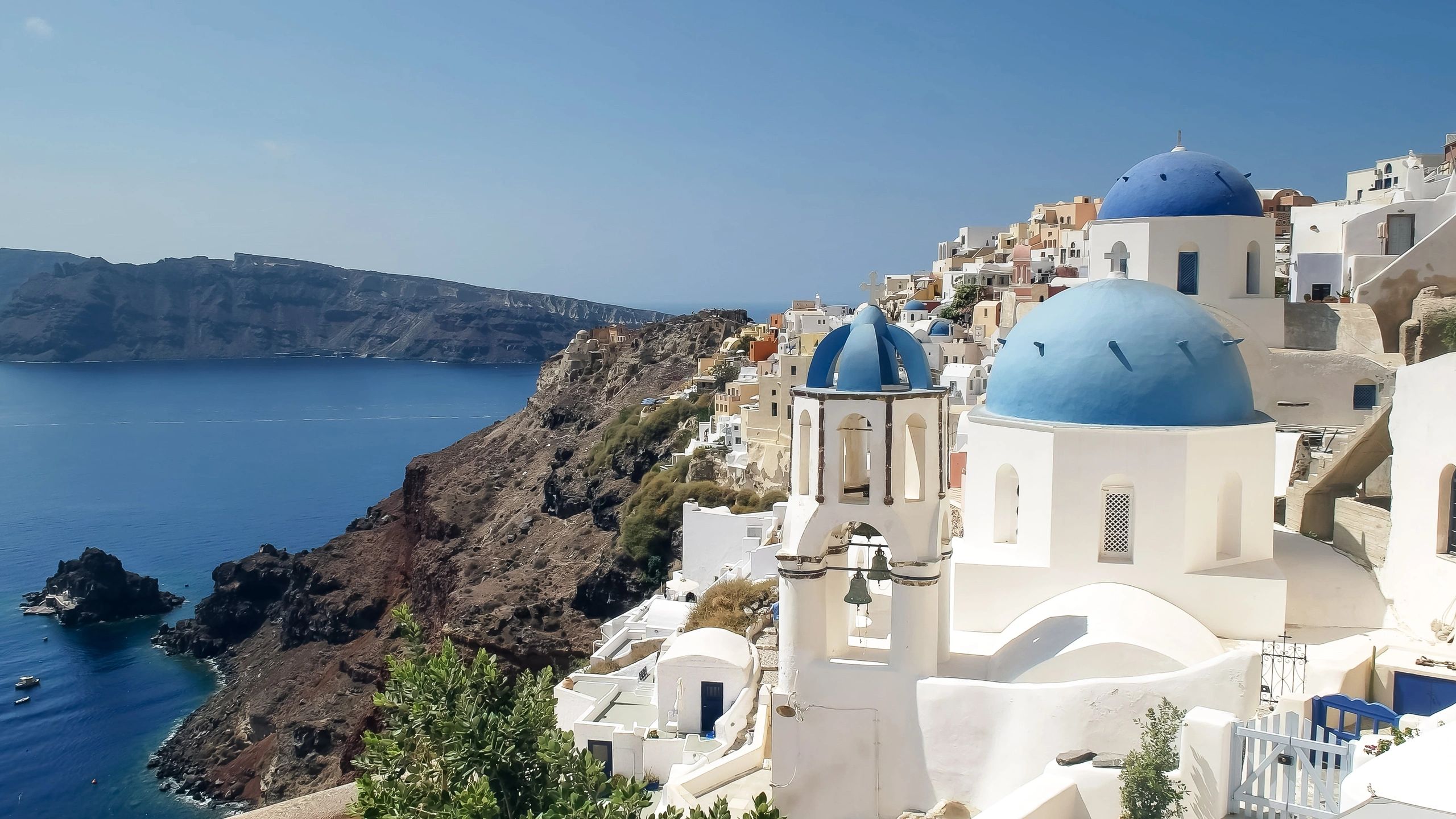 Oia, Santorini with white buildings and blue domes