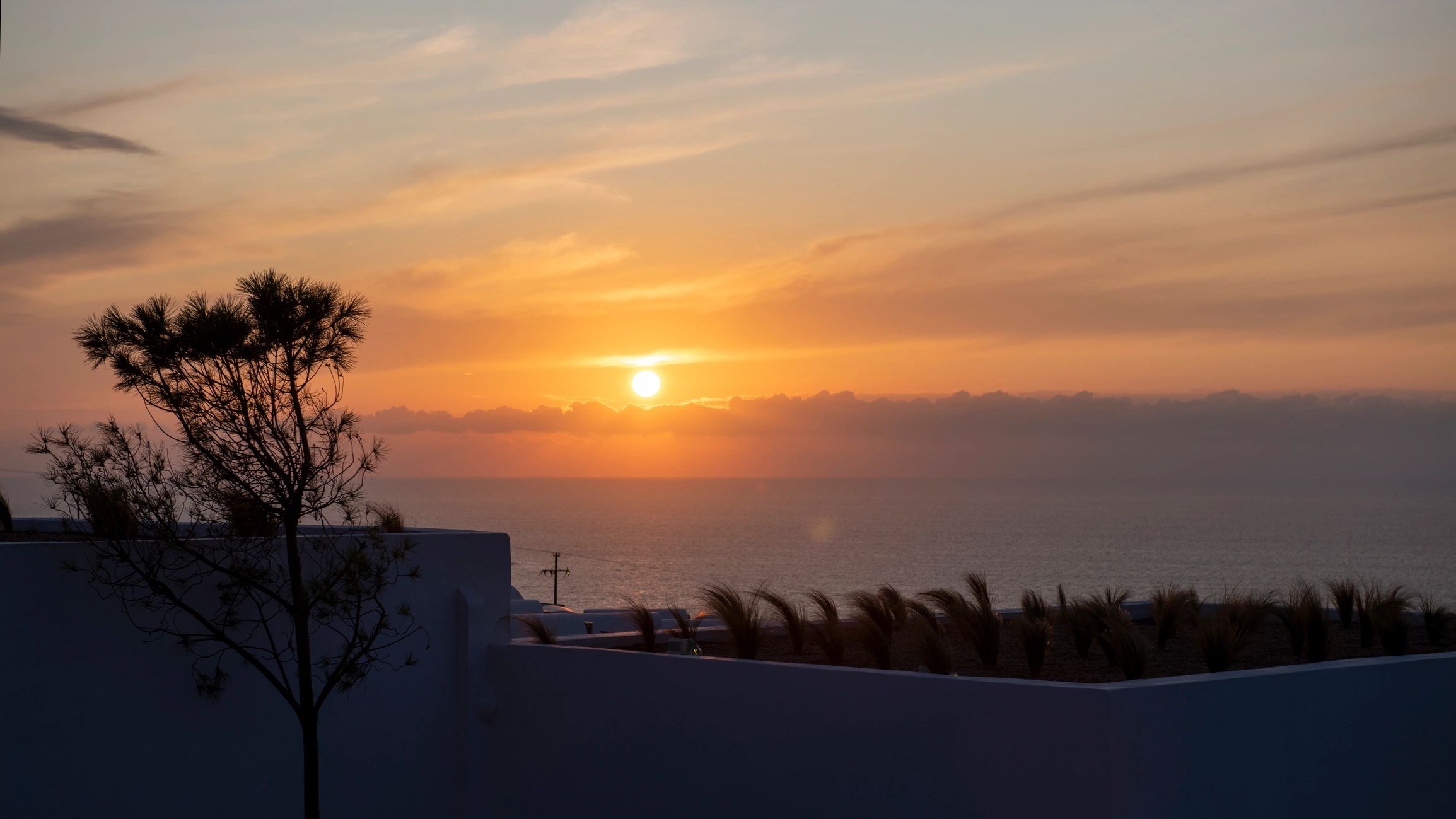 Sunset silhouettes in Oia, Santorini
