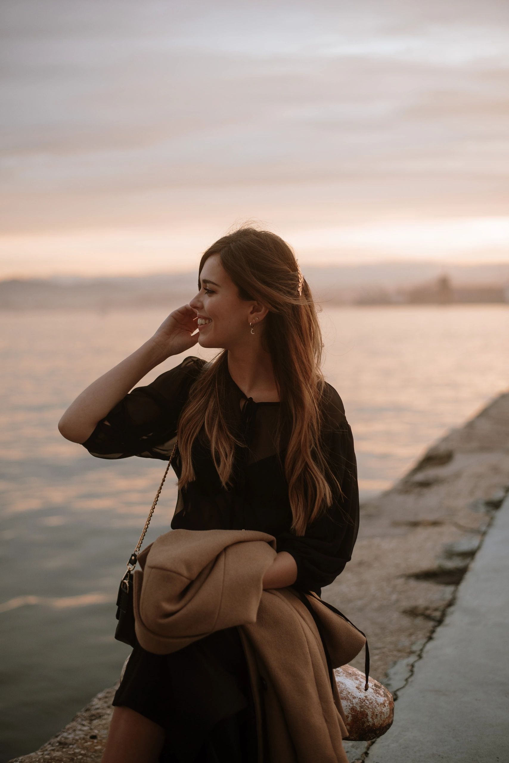 Portrait of Ana by the sea in natural light