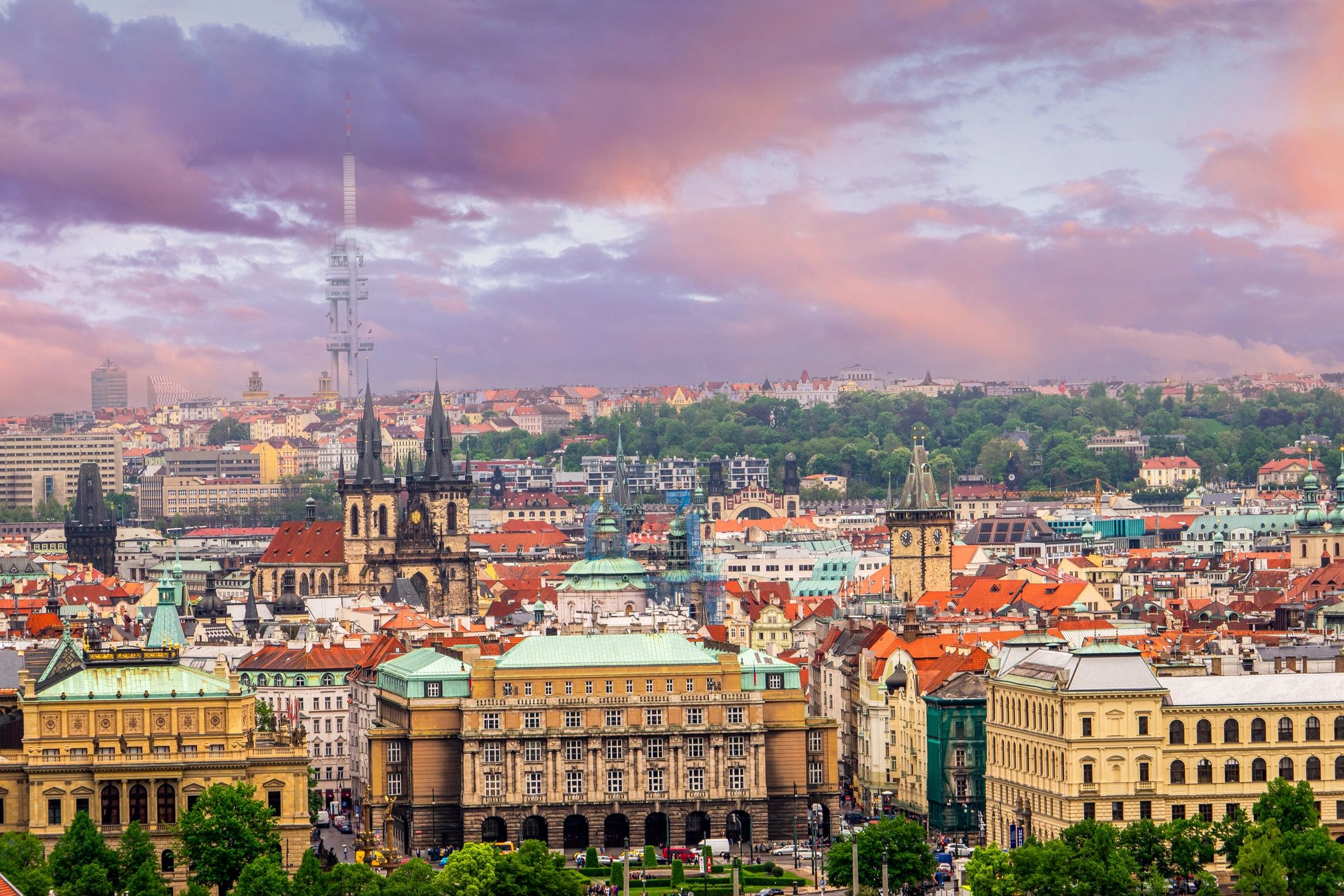 Panoramic view of Prague skyline with Prague Castle under a dramatic sky