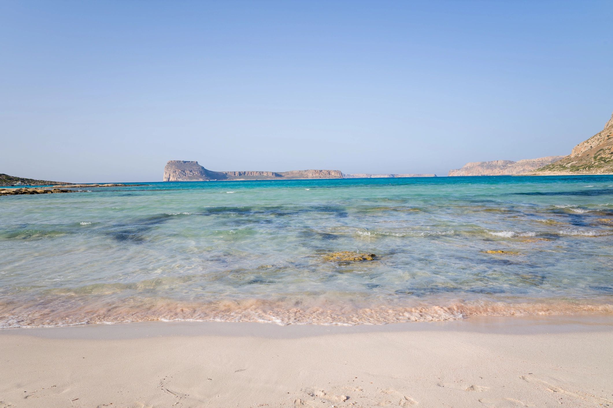 Shallow turquoise water and sandy beach, Crete