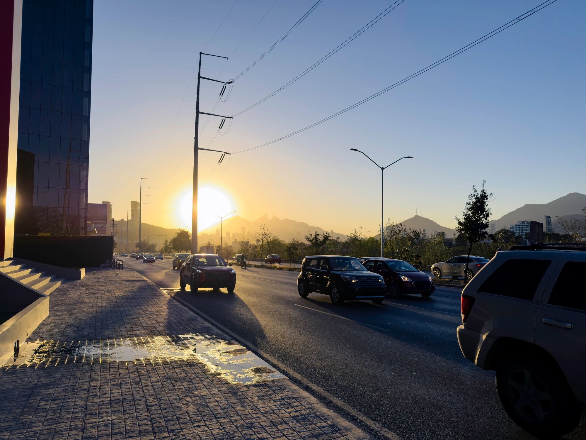 City at dawn with mountains in the distance