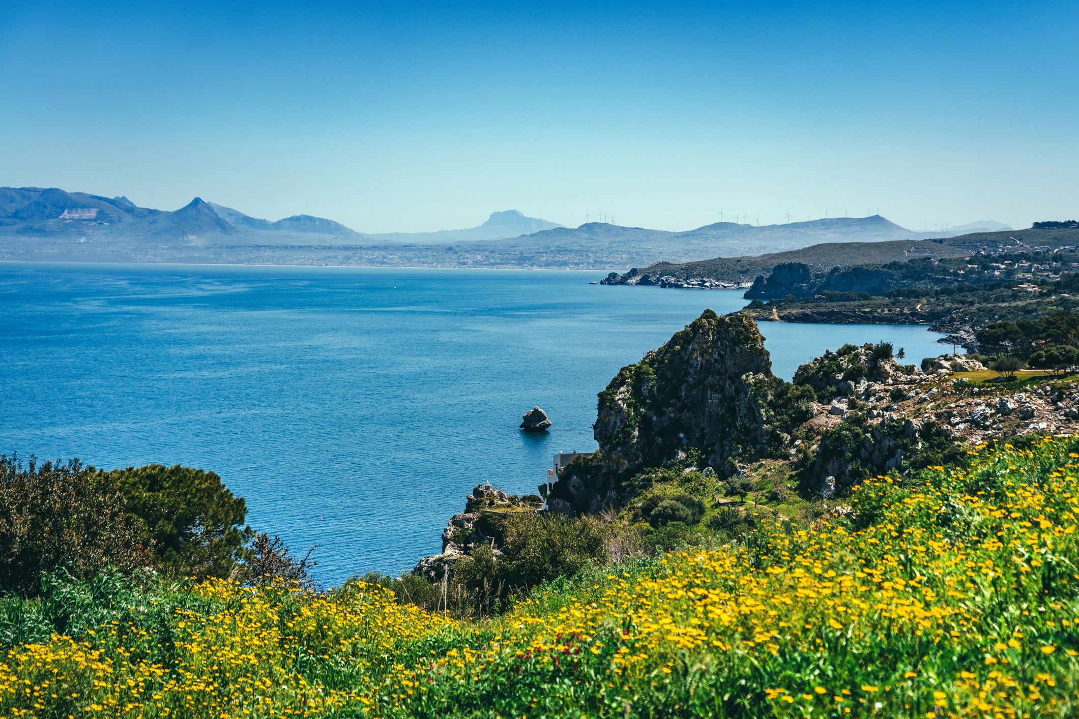 Coastal landscape in Sicily with cliffs and sea